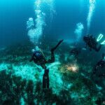 divers approaching the underwater museum of the peristera wreck